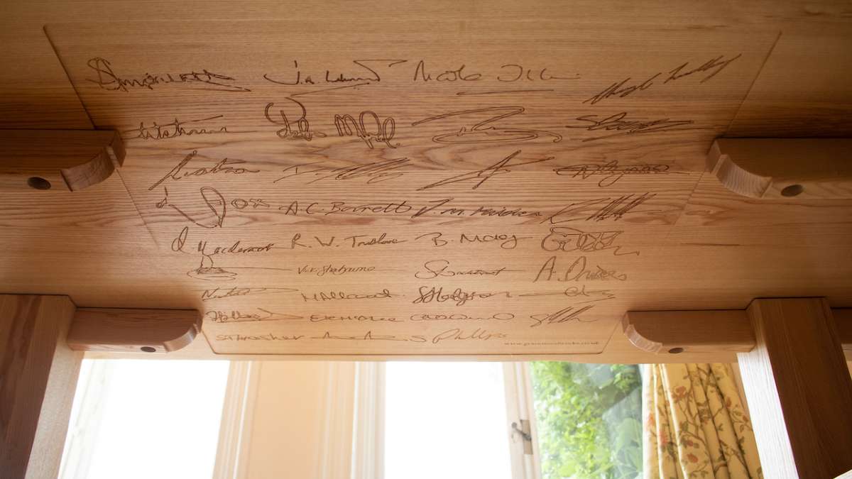 signed underside of table