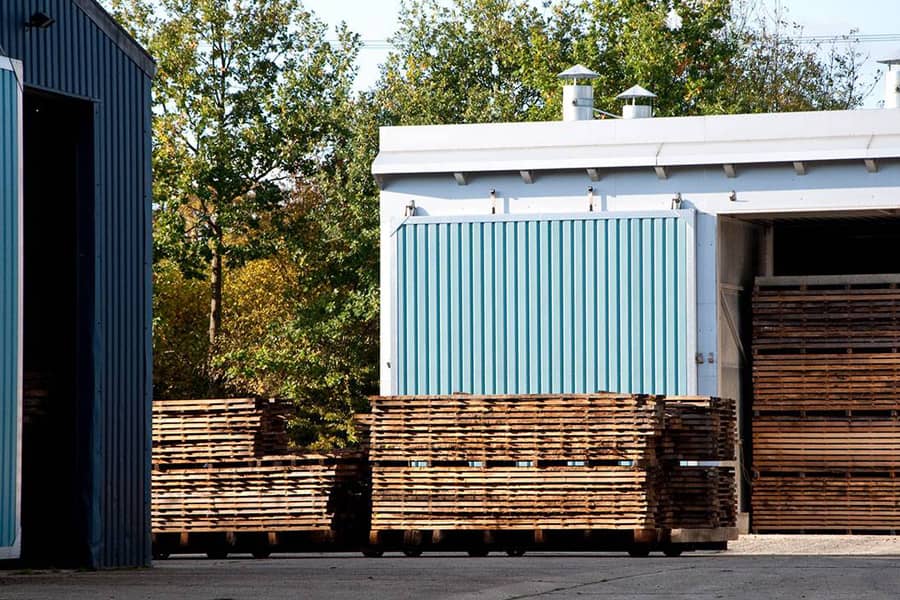 timber stacked in timber yard near kiln plant