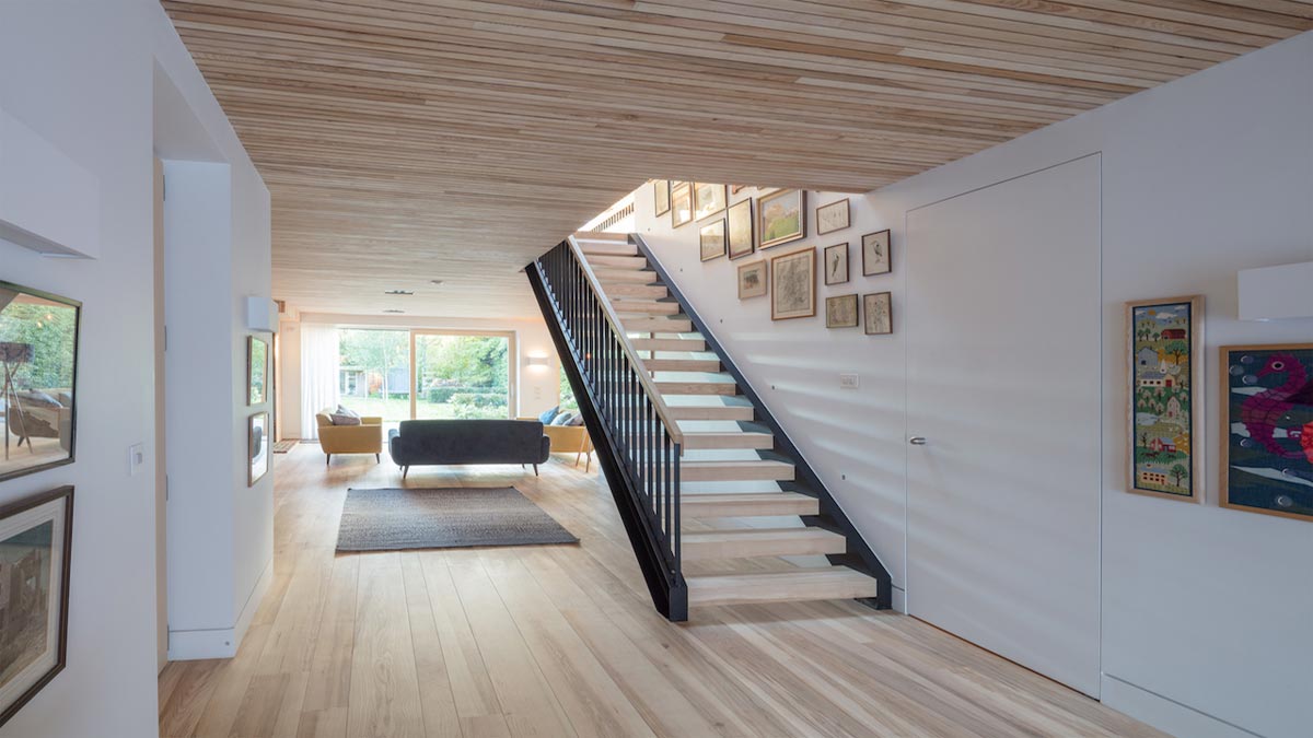 ash wood floors and ceilings with floating staircase