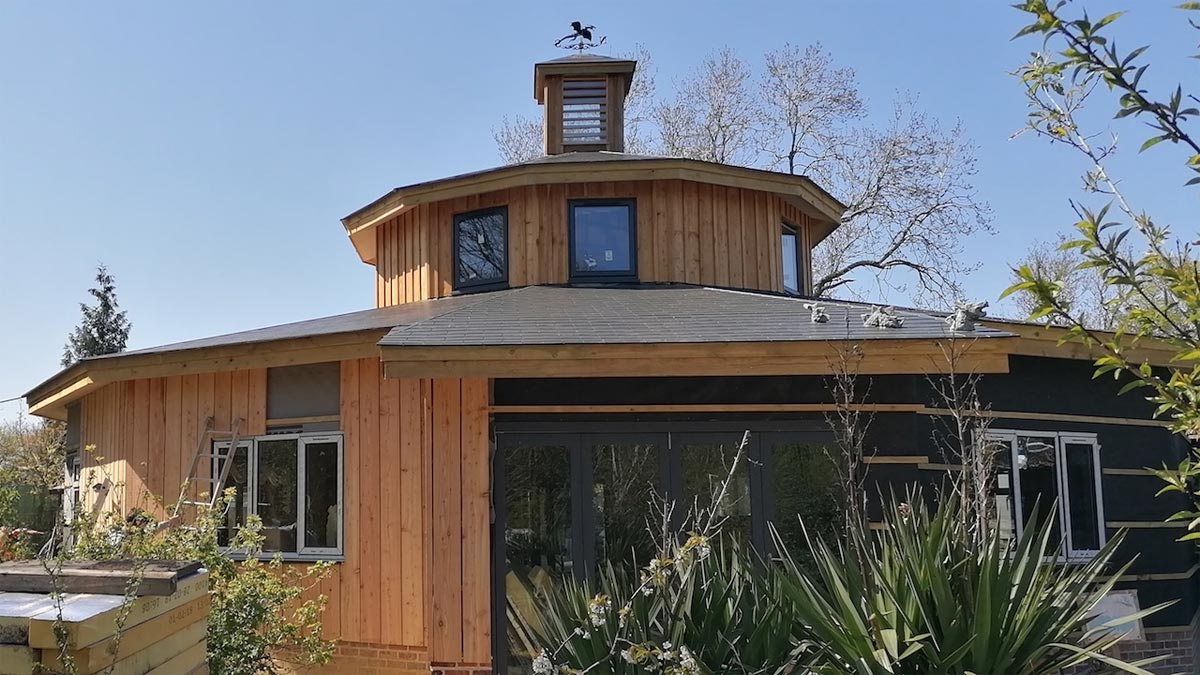 cedar clad building with octagonal roof