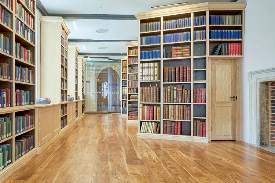 elm floor in rochester cathedral library with book shelves