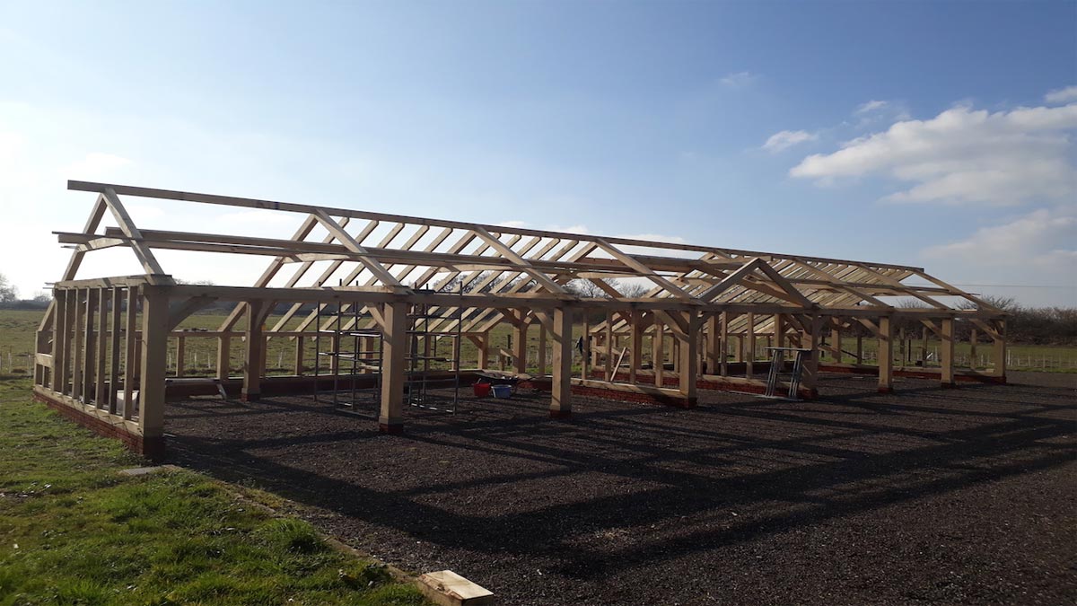 timber frame of seven bay cartlodge