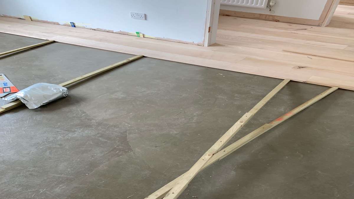 laying wood flooring on a concrete screed