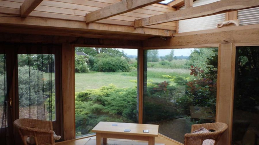 oak conservatory with view of garden