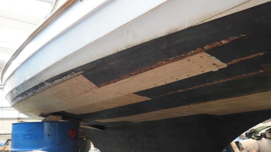 repair of underneath of wooden boat