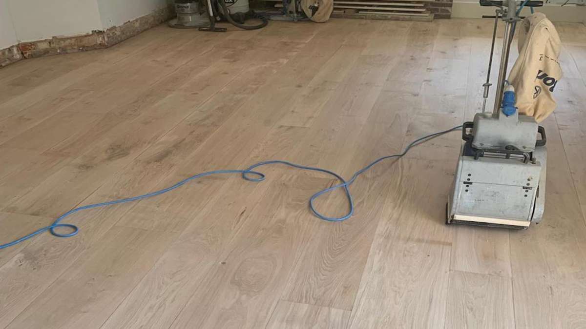 floor sanding machine on wood flooring