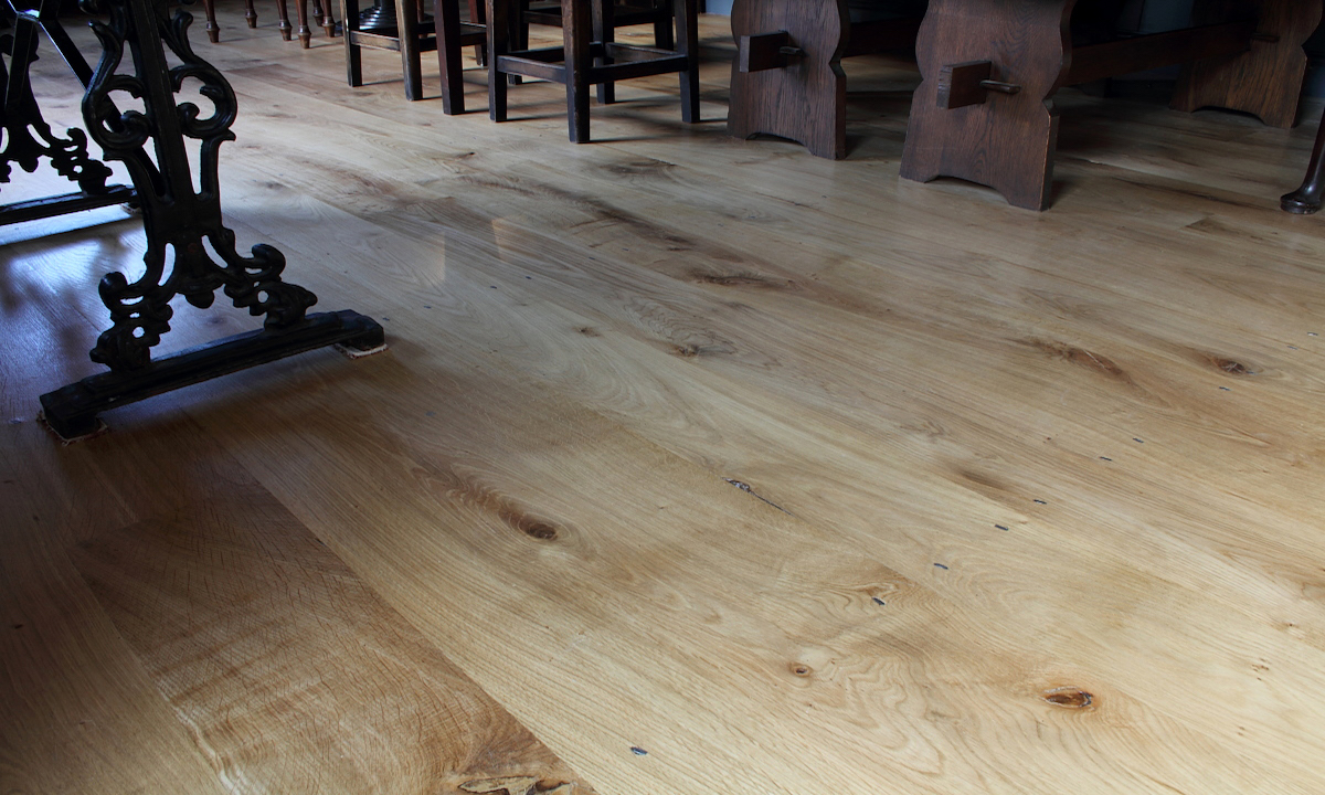 wood flooring view of bottoms of chair and table legs