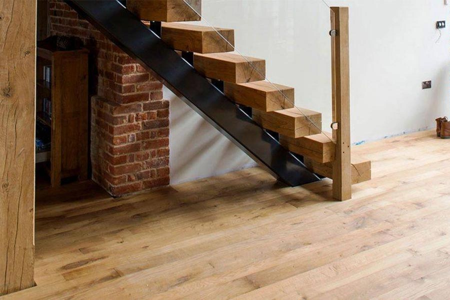 solid oak stair risers with glass panel and solid oak flooring