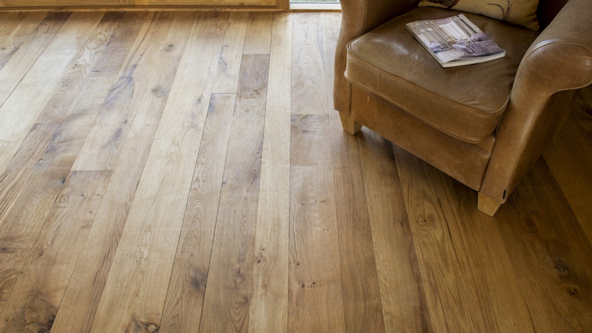 oak flooring with leather chair