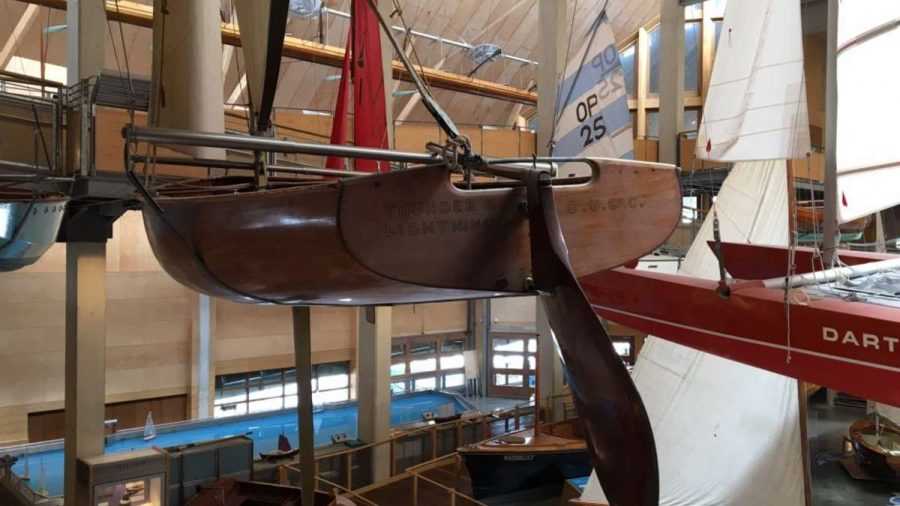 racing dingy on display in a museum