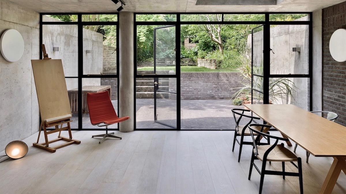 kitchen with open doors leading to terraced garden