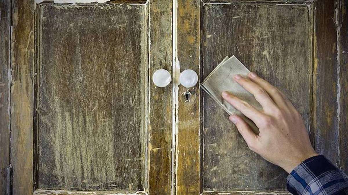 old cupboard doors being sanded